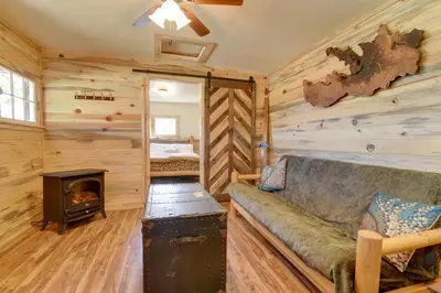 a living room with a couch and a fireplace at Hiawatha Peaceful Living in Rocky Mtn Natl Park in Allenspark