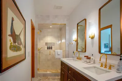 a bathroom with a sink and a shower at Mtn-View Retreat with Hot Tub in Granby! in Granby