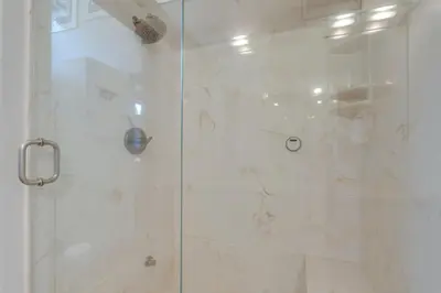 a shower with a glass door in a bathroom at Fraser House with Mtn Views Near Winter Park! in Fraser