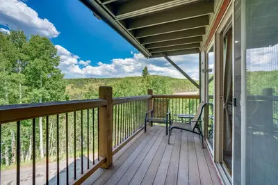 a screened porch with a bench on a deck at Pet-Friendly Apt with Views 6 Mi to Keystone Resort in Silverthorne