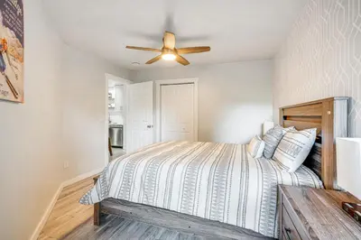 a bedroom with a bed and a ceiling fan at Pet-Friendly Apt with Views 6 Mi to Keystone Resort in Silverthorne