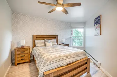 a bedroom with a bed and a ceiling fan at Pet-Friendly Apt with Views 6 Mi to Keystone Resort in Silverthorne