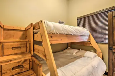 a bunk bed in a room with a bunk bedscribed at Elegant Frisco Condo with Private Hot Tub and Views! in Frisco