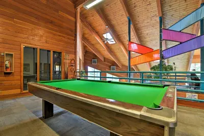a pool table in the middle of a room at Mtn-View Gem with Community Perks in Silverthorne! in Silverthorne