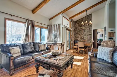 a living room with a couch and a table at 7 Mi to Rocky Mtn NP Updated Estes Park Home in Estes Park