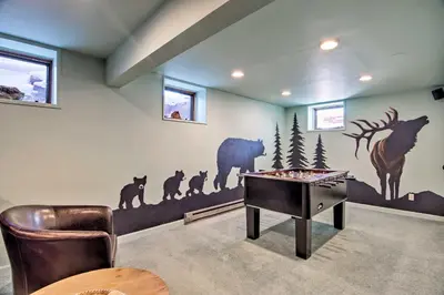 a room with a game table and animals on the wall at 7 Mi to Rocky Mtn NP Updated Estes Park Home in Estes Park