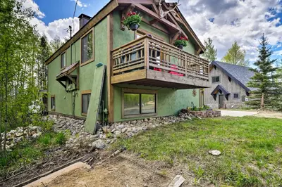 a house with a balcony on the side of it at Balcony, Fire Pit and Grill Grand Lake Retreat! in Grand Lake