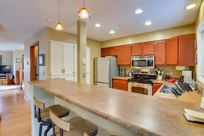 a kitchen with a large counter top in a room at 2 Mi to Frisco Ski Hill Mountain Home with Hot Tub! in Frisco