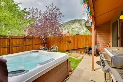 a hot tub in the backyard of a house at 2 Mi to Frisco Ski Hill Mountain Home with Hot Tub! in Frisco