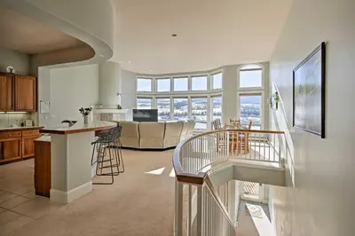 a kitchen and living room with a kitchen and a living room at Gorgeous Townhome with Fraser Valley Mountain Views! in Fraser