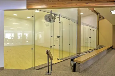 a gym with a basketball court and a basketball hoop at Gorgeous Townhome with Fraser Valley Mountain Views! in Fraser