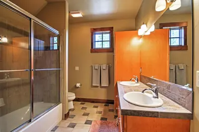 a bathroom with a sink and a shower at Tabernash Retreat with Hot Tub and Stunning Mtn Views! in Tabernash