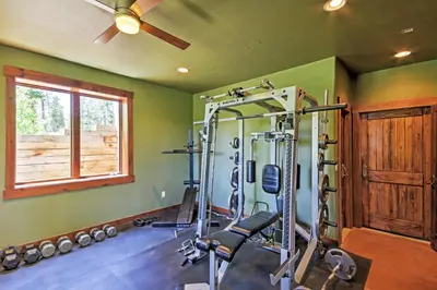a gym with a tread machine in a room at Tabernash Retreat with Hot Tub and Stunning Mtn Views! in Tabernash