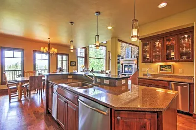 a kitchen with a sink and a counter top at Tabernash Retreat with Hot Tub and Stunning Mtn Views! in Tabernash
