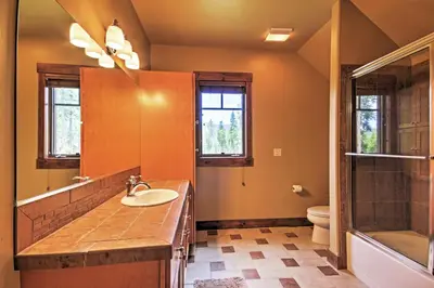 a bathroom with a sink and a shower at Tabernash Retreat with Hot Tub and Stunning Mtn Views! in Tabernash