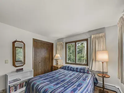 a bedroom with a bed and a window at CC43 Chateau Claire condo in Dillon