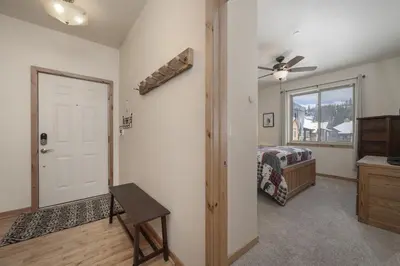a bedroom with a bed and a ceiling fan at Trailhead Lodge One Bedroom 801 condo in Winter Park