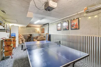 a ping pong table in a room at 2 Mi to Rocky Mountain Natl Park Cabin with Views in Grand Lake