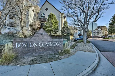 a sign for the bestion commons in front of a house at Greenwood Village Condo with Pool Access! in Greenwood Village