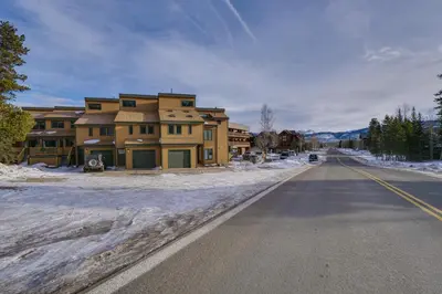 a house on the side of a road with snow at Updated Townhome Near Main Street, 10 Mi to Breck! in Frisco