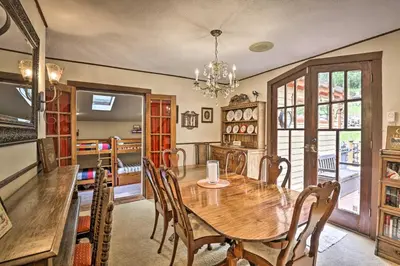 a dining room with a wooden table and chairs at Family Home in Georgetown Walk to Town and Railroad in Georgetown
