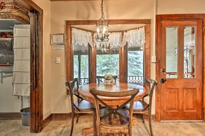 a dining room with a wooden table and chairs at Family Home in Georgetown Walk to Town and Railroad in Georgetown