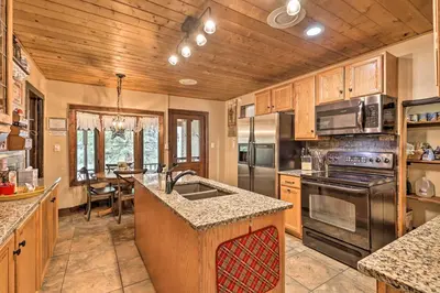 a kitchen with a sink and a stove top oven at Family Home in Georgetown Walk to Town and Railroad in Georgetown
