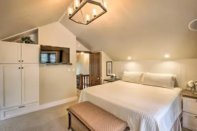 a bedroom with a white bed and a white cabinet at Family Home in Georgetown Walk to Town and Railroad in Georgetown