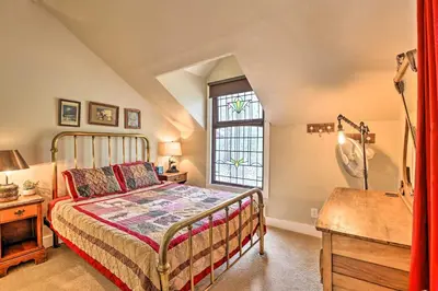 a bedroom with a bed and a window at Family Home in Georgetown Walk to Town and Railroad in Georgetown
