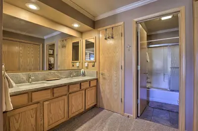 a bathroom with a sink and a shower and a tub at Grand Lake House with Mountain Views, Deck! in Grand Lake