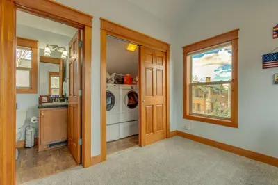 a laundry room with a washer and dryer at Riverfront Cabin, 4 Mi to Granby Ranch in Granby