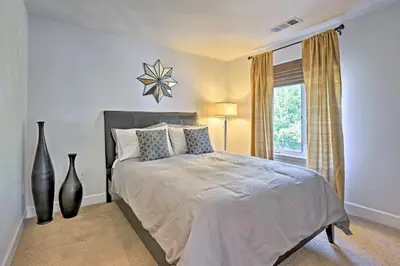 a bedroom with a large bed and a window at LoHi Apartment with Patio 1 Mi to Downtown Denver! in Denver