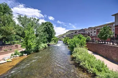 a river in a city with trees and buildings at Dtwn Golden Apt Less Than 9 Mi to Red Rocks Amphitheater! in Golden