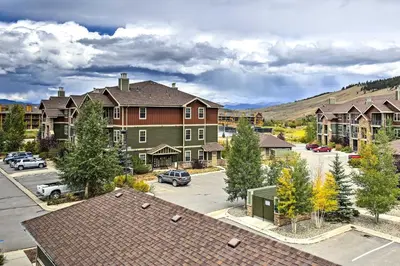 an aerial view of a town with houses and a parking lot at 18 Mi to Winter Park Granby Condo with Covered Deck in Granby
