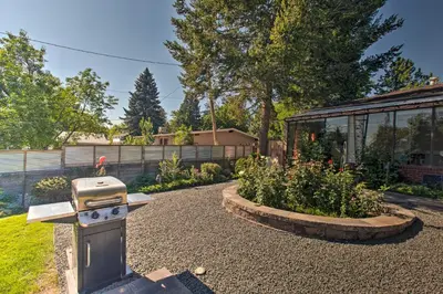 a backyard with a barbecue grill in a yard at Private Lake Family Home with Large Yard in Denver! in Denver