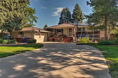 a driveway in front of a house at Private Lake Family Home with Large Yard in Denver! in Denver