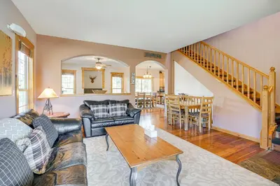 a living room with a couch and a table at 2 Mi to Frisco Slopes Cozy Retreat with Mtn Views! in Frisco