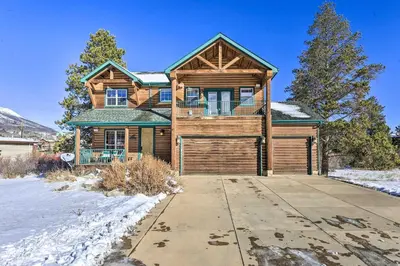 a large wooden house with a garage at 2 Mi to Frisco Slopes Cozy Retreat with Mtn Views! in Frisco