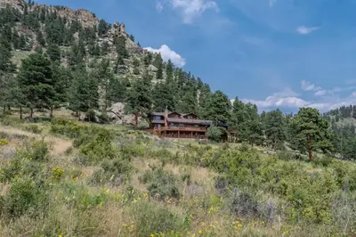 a house on the side of a mountain at Bishop's Retreat in Estes Park