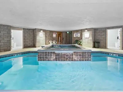 a large swimming pool with blue water in a building at 432 Marina Place condo in Dillon