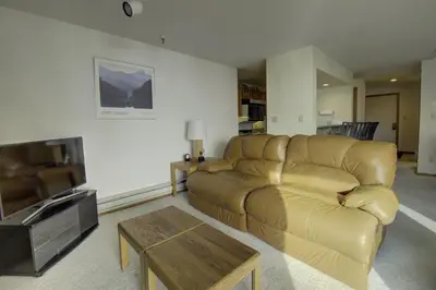 a living room with a couch and a tv at 432 Marina Place condo in Dillon