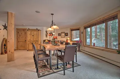 a dining room with a table and chairs at Fall River Hideaway in Estes - 3 Mi to Natl Park! in Estes Park
