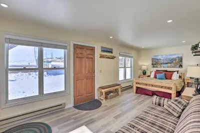 a bedroom with a bed and a window at Walk to Marina Rustic Grand Lake Retreat! in Grand Lake
