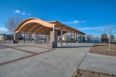 a pavilion with awning in a park at Charming Getaway, Walk to Windsor Lake and Downtown! in Windsor