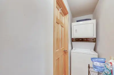 a kitchen with a refrigerator and a microwave at Cydney Ln 61C in Silverthorne