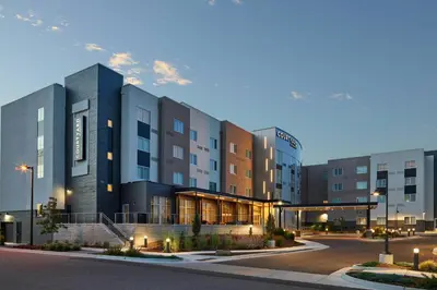 a rendering of a hospital building at night at Courtyard Denver Aurora in Aurora