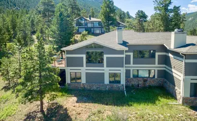 an aerial view of a house at Wanderlust Luxury Vacation Home at Windcliff condo in Estes Park