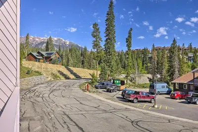 a group of cars parked in a parking lot at Silverthorne Condo with Views about 11 Mi to Ski Slopes in Silverthorne
