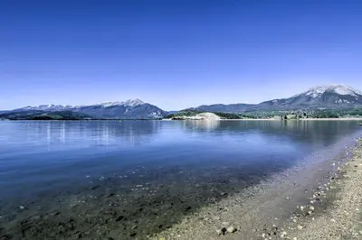 a view of a lake with mountains in the background at Mtn Views and Hot Tub Access Lake Dillon Retreat in Dillon