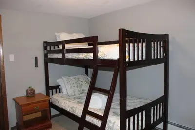 a couple of bunk beds in a room at Casa Colo in Fraser